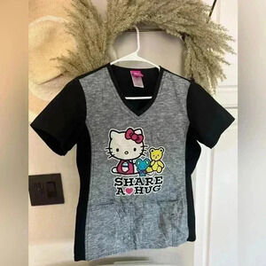 Sanrio Hello Kitty Medical Scrubs Top -
Size XS in great condition🖤💖